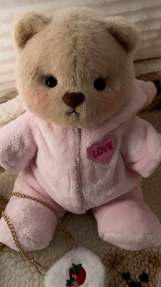 Cute Teddy Bear in a Pink Suit